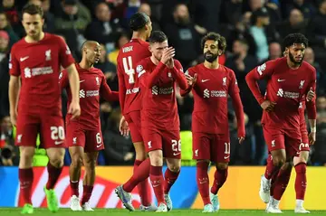Mohamed Salah (2nd right) scored the fastest hat-trick in Champions League history against Rangers