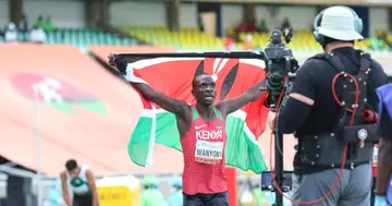 Emmanuel Wanyonyi celebrates after he smashed the championships record in the Mens 800m with a time of 1:43.76. Photo: Twitter/@WAU20Nairobi21.