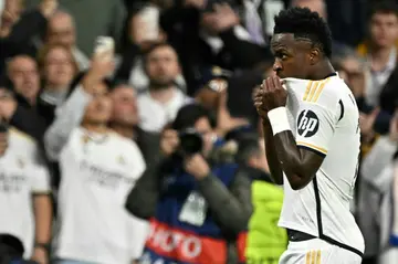 Real Madrid's Brazilian forward Vinicius Junior celebrates scoring the opening goal against RB Leipzig