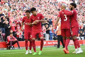Liverpool players are seen celebrating