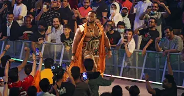 Big E arrives for his match during the World Wrestling Entertainment (WWE) Crown Jewel pay-per-view in the Saudi capital Riyadh on October 21, 2021. (Photo by Fayez Nureldine / AFP)