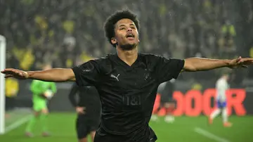 Karim Adeyemi scored Dortmund's opening goal against Hertha Berlin before picking up a muscle injury