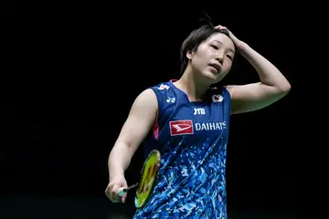 Akane Yamaguchi reacts in the Women's Singles Quarter Finals