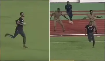 Athletic pitch invader in Chelsea jersey takes stewards on wild chase during Ghana - South Africa game