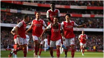 Gabriel Martinelli of Arsenal celebrates with teammates after scoring during the Premier League match between Arsenal FC and Liverpool FC at Emirates Stadium. Photo by Justin Setterfield.