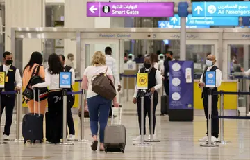 Passengers in Terminal 3 at Dubai International Airport on August 16, 2022