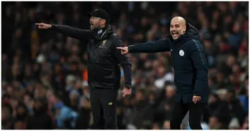Man City boss Pep Guardiola and his Liverpool counterpart Jurgen Klopp giving their team instructions during a past Premier League match. Photo by Shaun Botterill.
