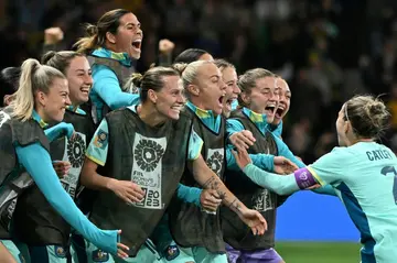 Australia defender  Stephanie Catley (R) celebrates with teammates in Melbourne