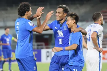 Teerasil Dangda (second left) made it three for BG Pathum when he tapped in at the back post in the 68th minute