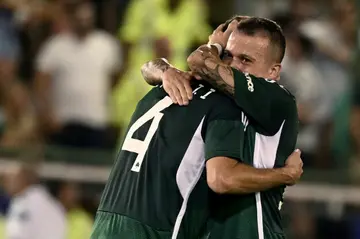 Late show: Panathinaikos' Brazilian midfielder Bernard (right) celebrates with Ruben Perez after victory over Marseille