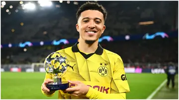 Jadon Sancho poses for a photo with the PlayStation Player Of The Match award after the UEFA Champions League match between Borussia Dortmund and PSV Eindhoven at Signal Iduna Park. Photo by Alexander Scheuber.