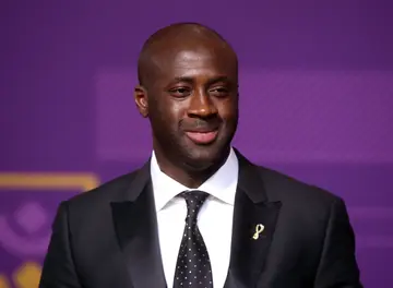 Yaya Toure arrives prior to the FIFA World Cup Qatar Final Draw at the Doha Exhibition Centre in Doha