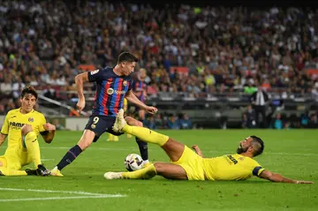 Barcelona forward Robert Lewandowski turns before scoring the first goal against Villarreal
