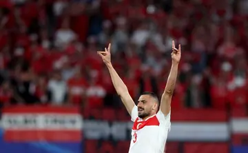 Turkey's defender Merih Demiral makes a controversial hand gesture as he celebrates scoring his team's second goal during the UEFA Euro 2024 round of 16 football match between Austria and Turkey.
