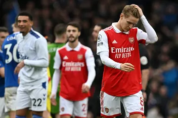 Arsenal midfielder Martin Odegaard reacts after their defeat at Everton