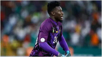 Andre Onana reacts during the Africa Cup of Nations match between Senegal and Cameroon at the Stade Charles Konan Banny. Photo by Kenzo Tribouillard.