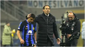 Inter's Simeone Inzaghi and Alexis Sanchez