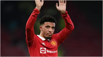 Jadon Sancho waves at the end of the English Premier League football match between Manchester United and Leeds United at Old Trafford. Photo by Oli Scarff.