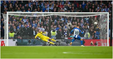 Alexis Mac Allister scores his penalty past David de Gea during the FA Cup Semi-Final match between Brighton and Manchester United at Wembley Stadium. Photo by Craig Mercer.