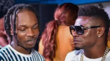 Former Super Eagles Striker Spotted Hanging Out With Nigerian Music Sensation Naira Marley