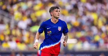 Former Chelsea player and AC Milan star, Christian Pulisic, in action for the United States of America.