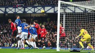 Andre Onana saves from Dominic Calvert-Lewin during the Premier League match between Everton FC and Manchester United at Goodison Park. Photo by Robbie Jay Barratt.