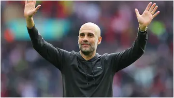 Pep Guardiola waves to the supporters following the Emirates FA Cup semi-final between Manchester City and Sheffield United at Wembley Stadium. Photo by James Gill.