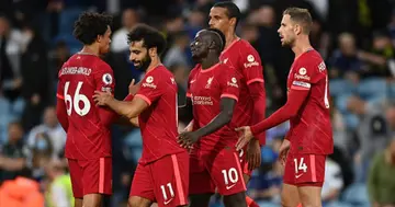 Sadio Mane of Liverpool celebrates with teammates after scoring his side's third goal during the Premier League match between Leeds United and Liverpool at Elland Road on September 12, 2021 in Leeds, England. (Photo by Shaun Botterill/Getty Images)