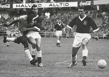 The King: Pele in action for Brazil against Wales during the 1958 World Cup