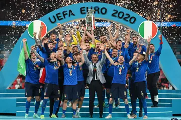 Italy lift the Henri Delaunay Trophy following their victory in the UEFA Euro 2020 Championship Final against England at Wembley Stadium. Photo: Michael Regan.