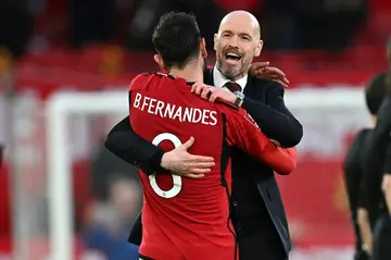 Manchester United's 4-3 victory over Liverpool eased the pressure on Erik ten Hag (right)