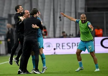 Tottenham players celebrate after Pierre-Emile Hojbjerg's late winner