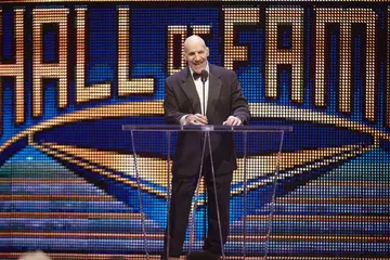 Bruno Sammartino on a podium during a ceremony at SAP Centre