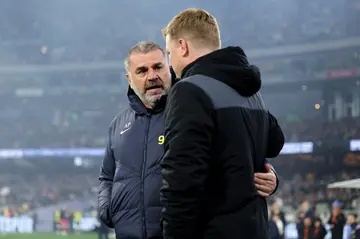 Tottenham manager Ange Postecoglou (left) with Newcastle counterpart Eddie Howe at the Melbourne Cricket Ground