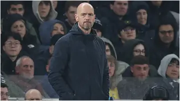Erik ten Hag watches from the touchline during the Premier League match between Tottenham Hotspur and Manchester United. Photo by Matthew Peters.