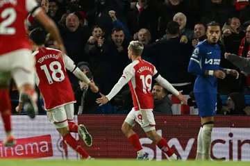 Arsenal's Leandro Trossard (C) celebrates scoring against Chelsea