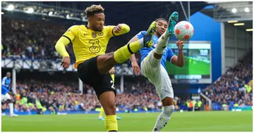 Reece James of Chelsea battles for possession with Mason Holgate of Everton during the Premier League match between Everton and Chelsea at Goodison Park. Photo by James Gill.