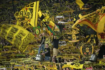 Borussia Dortmund's fans cheer on their team, who went one clear atop the table after beating Eintracht Frankfurt on Saturday