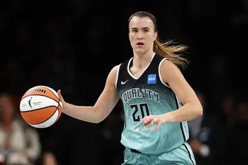 Sabrina Ionescu of the New York Liberty dribbles during the second half against the Connecticut Sun