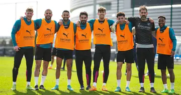 Man City's Kevin De Bruyne, Kyle Walker, Riyad Mahrez, lkay Gündoan, John Stones, Sam Edozie, Scott Carson and Raheem Sterling in action during a training session. Photo: Tom Flathers.