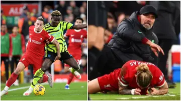 Kostas Tsimikas had to be substituted after colliding with Klopp.