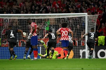 Lukas Hradecky's penalty save sent Atletico crashing out of the Champions League