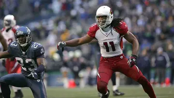 American football player with dreadlocks