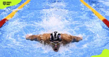 Michael Phelps competes in the Men's 200m swimming event.