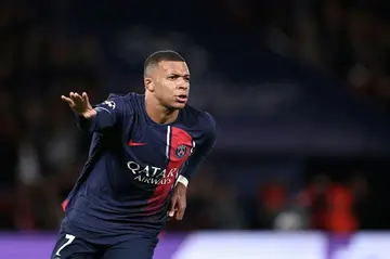 Kylian Mbappe celebrates after putting Paris Saint-Germain ahead against AC Milan