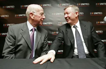 Bobby Charlton (left), pictured with Alex Ferguson