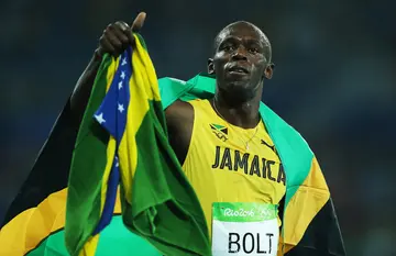 Usain Bolt of Jamaica celebrates after he wins Gold in the final of the Men's 200m during the Rio Olympic Games