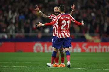 Memphis Depay marked his first Atletico start with the first two goals in a demolition of Sevilla