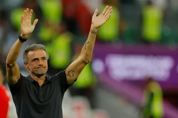 Spain coach Luis Enrique waves to supporters after his team lost the Qatar 2022 World Cup round of 16 clash with Morocco
