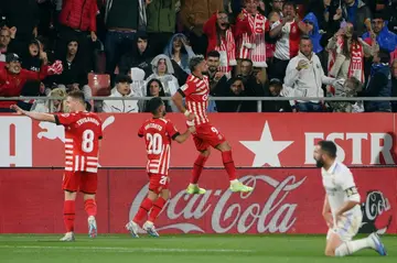 Girona's Argentinian forward Taty Castellanos (3L) celebrates his fourth goal during the win over Real Madrid.